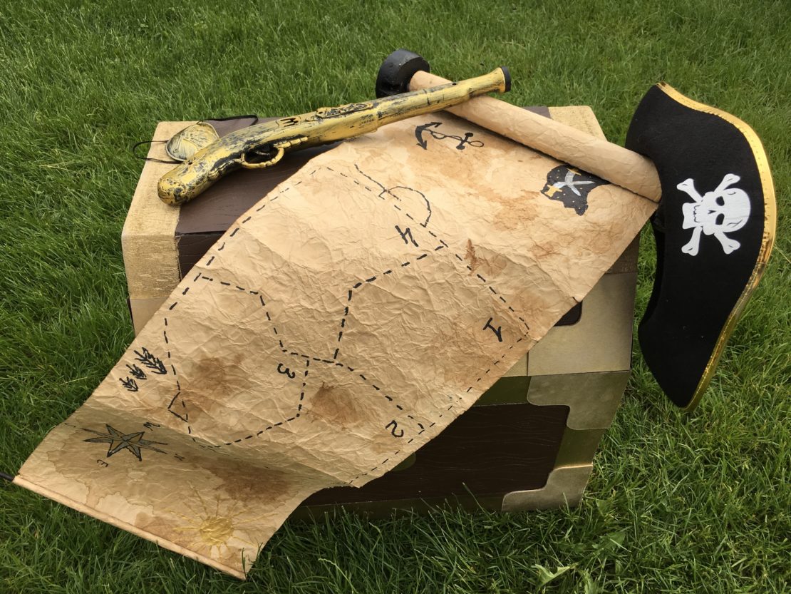 treasure map treasure chest pirate gun and pirate hat