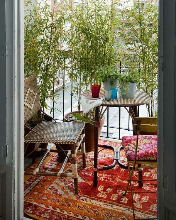 Boho balcony with bamboo privacy screen