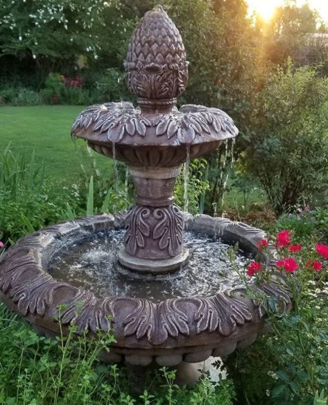 16 Vintage Garden Decor Ideas: Upcycle Glamour to a Garden 15 a classical fountain with two tiers and a botanical design