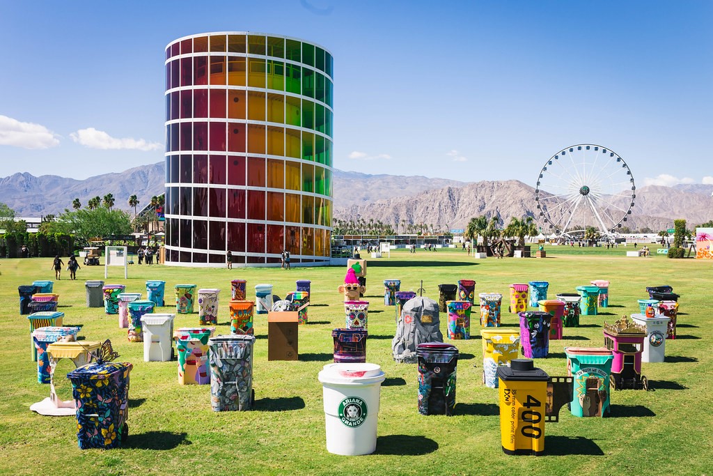 Bin Storage Ideas: How to Hide Your Wheelie Bins and Conceal Your Compost 12 a collection of 50 wheelie bins all painted for the Coachella festival TRASHED project