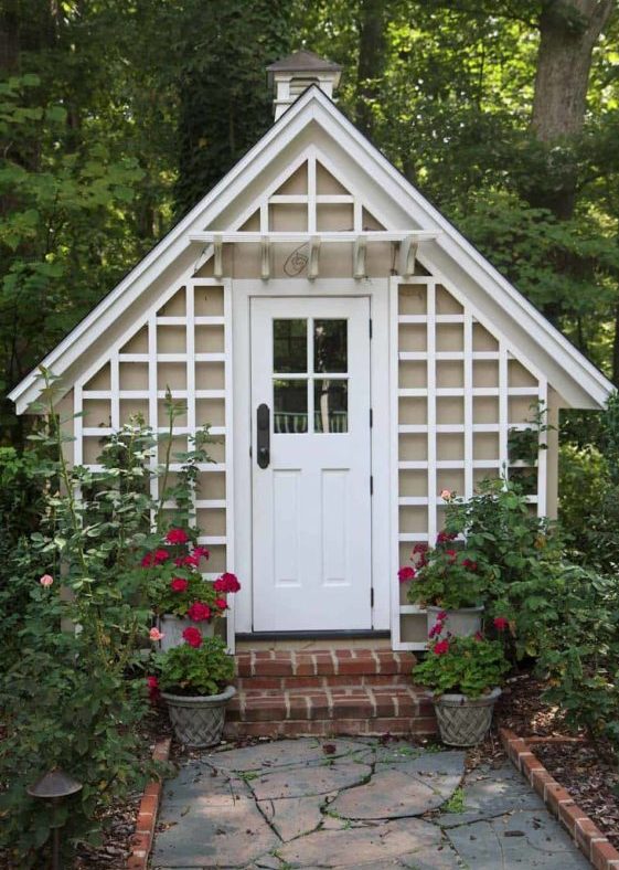 40 Garden Shed Ideas for Pretty to Practical Outdoor Buildings 2 a very cute she shed with a trellis completely covering the front