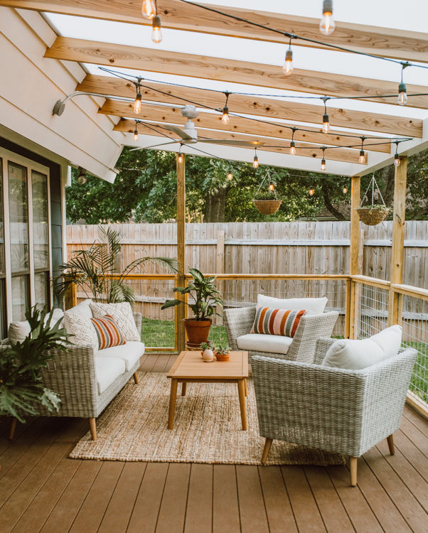 18 Garden Gazebo Ideas for an Outdoor Shelter from the Sun 19 a simple deck with pale awning and string lighting going across it