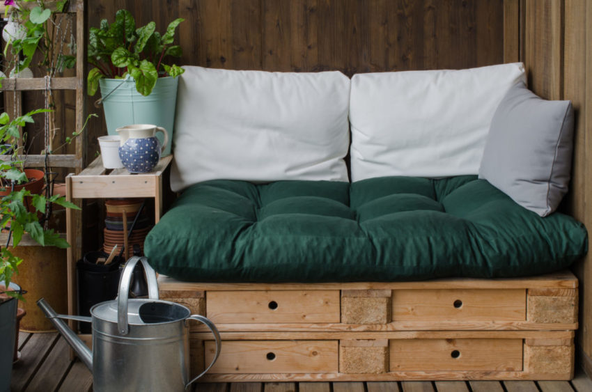 14 Garden Tool Storage Ideas: Keeping Your Shed Ship-Shape 14 a garden seat made from two stacked pallets covered with a squashy pillow and cushioned back suppot