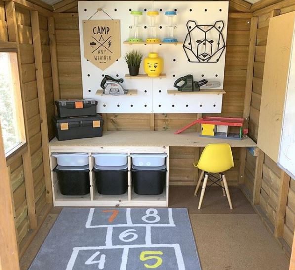13 Outdoor Toy Storage Ideas for Any Garden Style 6 outdoor toy storage ideas using a play house with trays, baskets and a pegboard