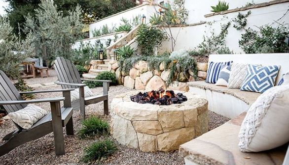 Spanish Themed Garden Ideas: Turn Your Garden into a Sizzling Iberian Sanctuary 2 a stone fire pit with low, comfy seating around it