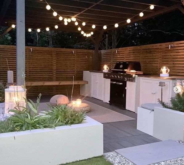 outdoor kitchen ideas with a gazebo garden lighting and seating