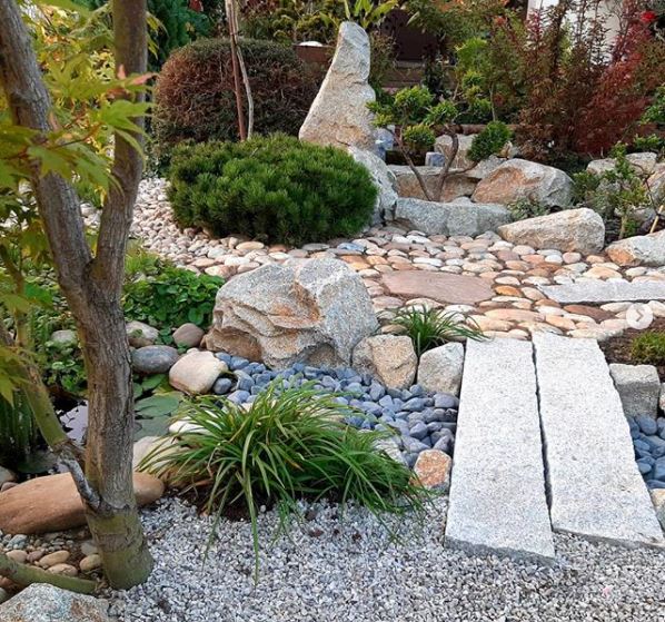 Japanese garden ideas with blue rocks representing a river