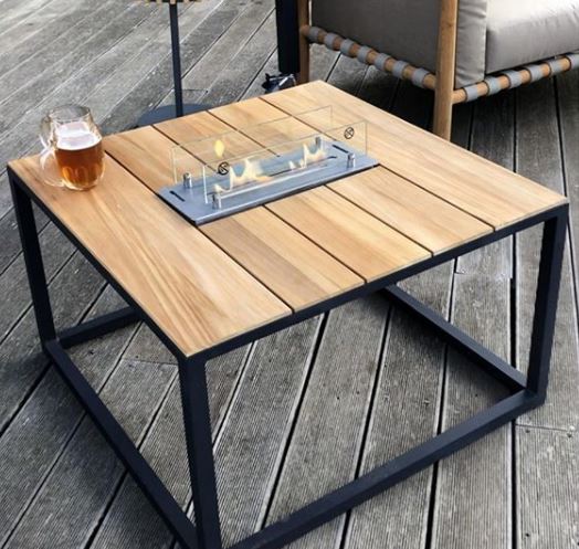 29 Garden Fire Pit Ideas for Cosy Evening Get-Togethers 14 a modern industrial style fire pit table