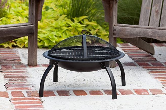 29 Garden Fire Pit Ideas for Cosy Evening Get-Togethers 3 a portable fold up fire pit for gardens, camping or the beach