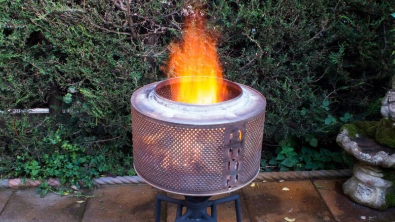 29 Garden Fire Pit Ideas for Cosy Evening Get-Togethers 17 garden fire pit ideas using a washing machine