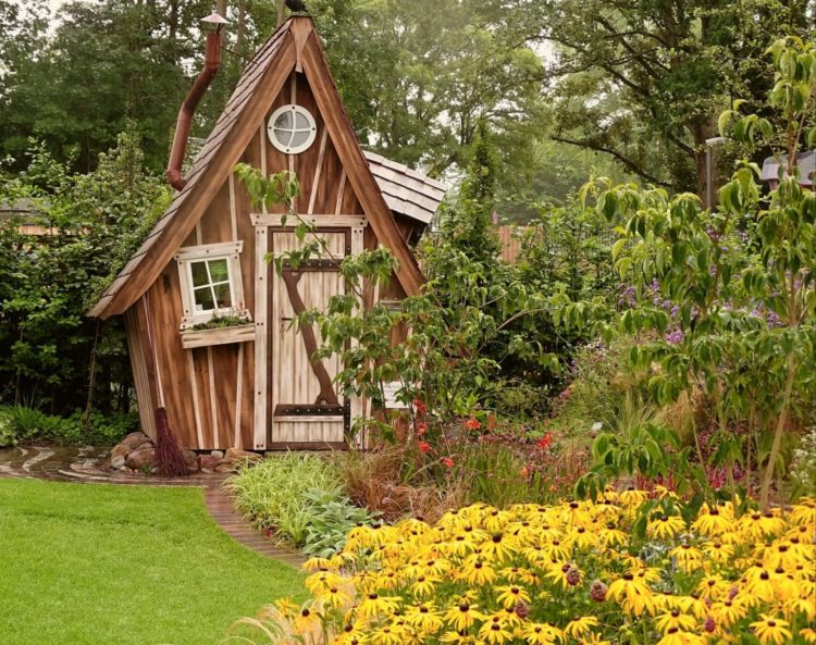 40 Garden Shed Ideas for Pretty to Practical Outdoor Buildings 40 a whimsical, crooked-looking shed that could be from a storybook