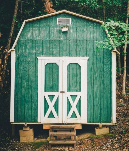 40 Garden Shed Ideas for Pretty to Practical Outdoor Buildings 7 an american barn style shed painted green