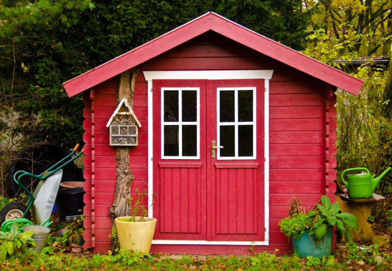 40 Garden Shed Ideas for Pretty to Practical Outdoor Buildings 14 a bright red shed with a white trim