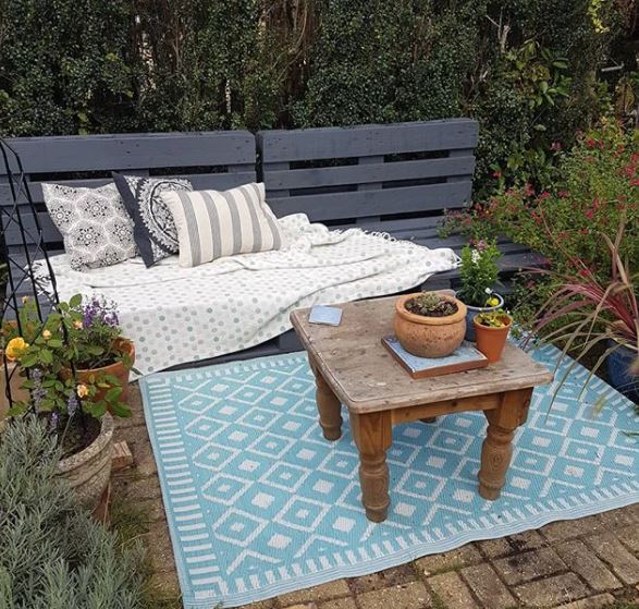 26 DIY Pallet Garden Ideas of Things to Make With Pallets 8 a garden bench made from wooden pallets painted grey