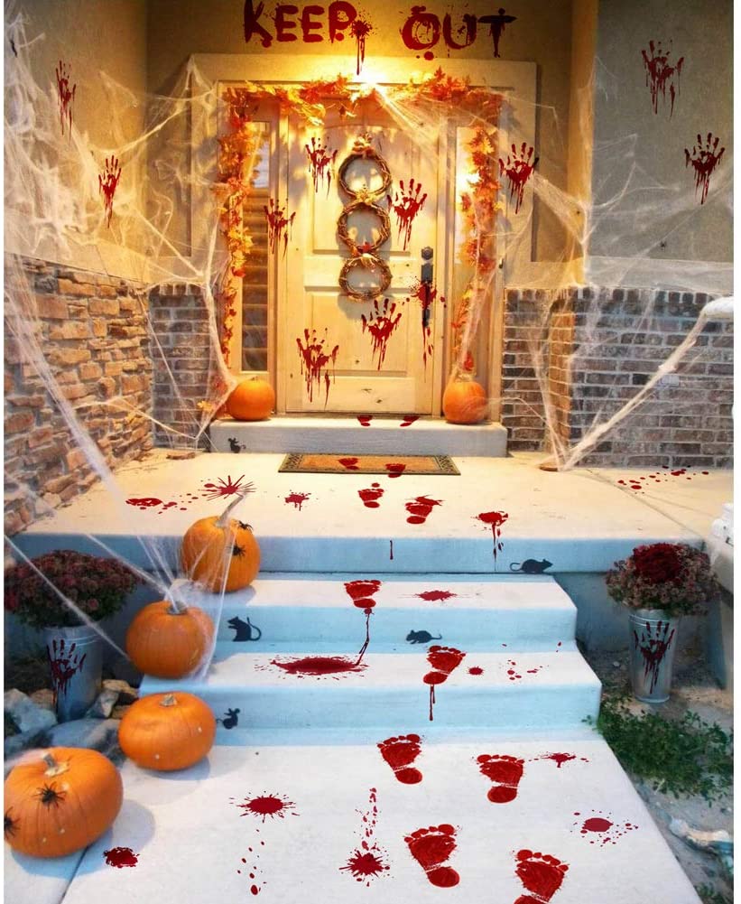 22 Halloween Garden Ideas: Fun & Low-cost Spooky Decorations 7 an entryway with vinyl decals that look like bloody hand prints and foot prints
