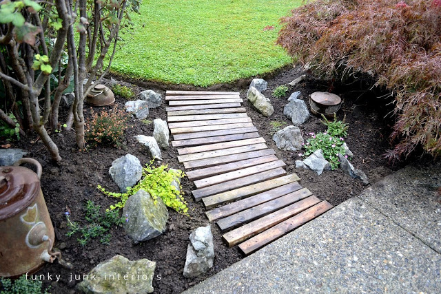 26 DIY Pallet Garden Ideas of Things to Make With Pallets 26 a wooden walkway made from parts of pallet