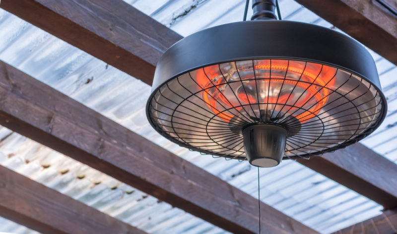 an overhead electric heat lamp for a patio or gazebo
