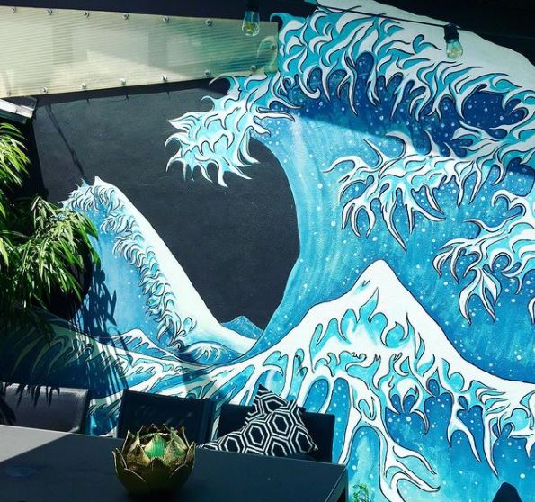 29 Unique Garden Mural Ideas for Outdoor Walls & Fences 9 garden mural ideas of a huge, stylised wave, inspired by a Japanese artwork