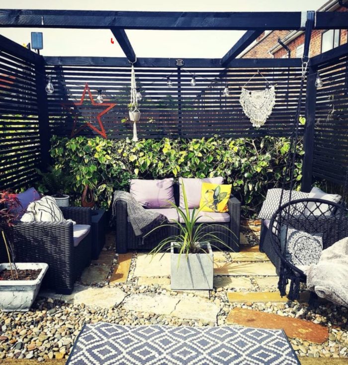 18 Garden Gazebo Ideas for an Outdoor Shelter from the Sun 11 garden seating area with wooden pergola featuring screens for privacy and wind protection