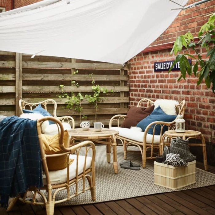 18 Garden Gazebo Ideas for an Outdoor Shelter from the Sun 7 a welcoming deck area with an angled canvas cover over the bamboo seating