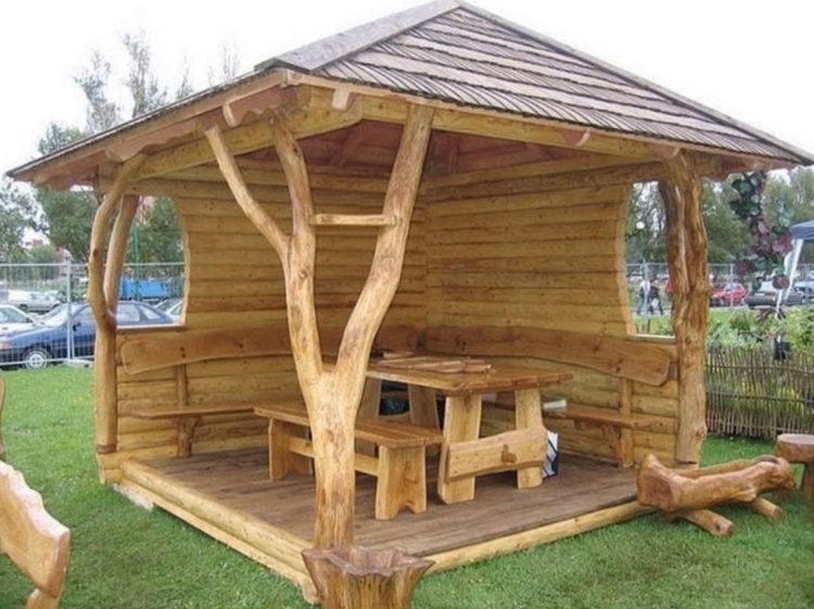 18 Garden Gazebo Ideas for an Outdoor Shelter from the Sun 15 a natural wooden gazebo with supporting columns shaped like branches