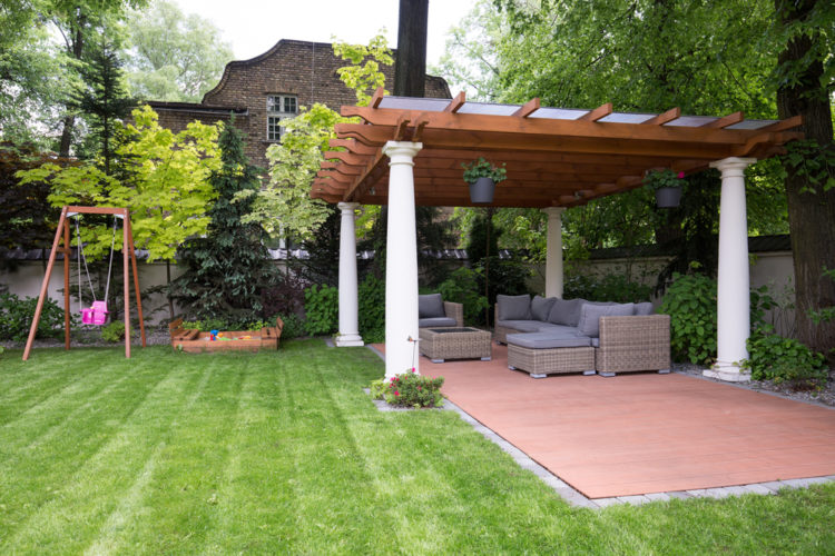 18 Garden Gazebo Ideas for an Outdoor Shelter from the Sun 2 a large pergola with classical stone columns above a brick patio