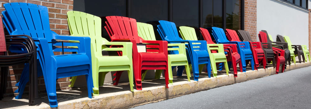 Colorful resin chairs in a row
