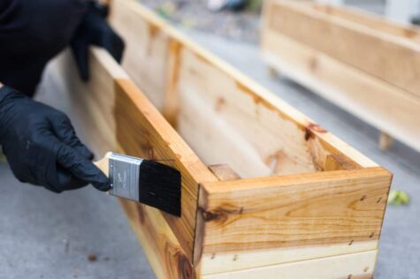 How to Make an Angled Planter Box (Step by Step) 2 staining cedar planter box
