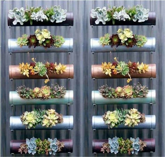 23 Fence Planter Box Ideas to Decorate Railing & Fences 20 PVC Pipe Tiered Planters