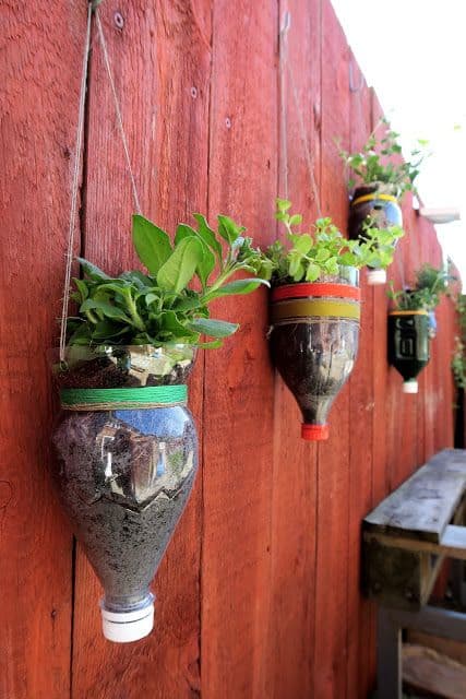 23 Fence Planter Box Ideas to Decorate Railing & Fences 21 Plastic Bottle Fence Planters