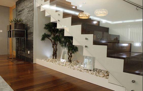 15 Indoor Pebble Garden Under Stairs Ideas: Mini Zen Areas 3 bonsai & large white pebbles indoor garden