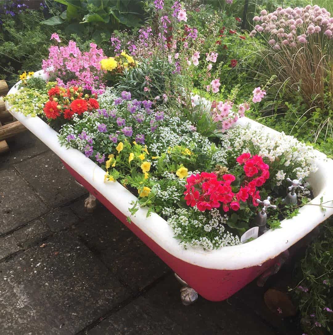 How to Make a DIY Flower Pot Stand (15 Easy Ideas) 1 old bathtub flower pot stand