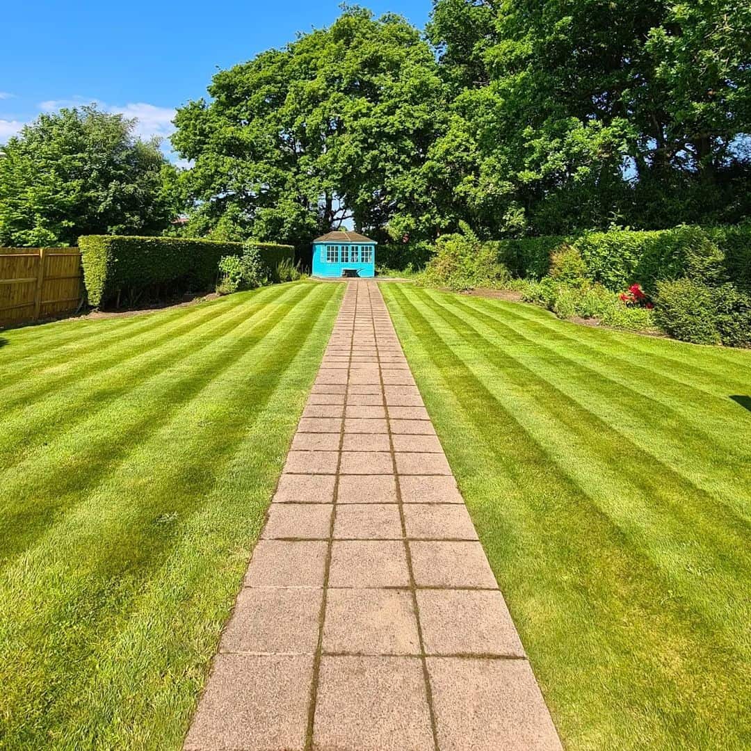 stone path with lawn stripes