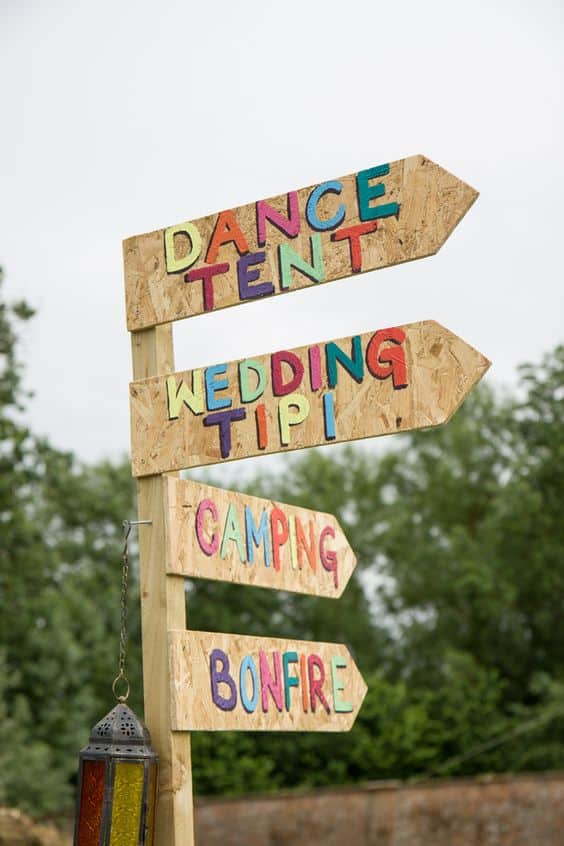 12 Festival-themed Garden Party Ideas to Free Your Spirit 15 diy festival signpost