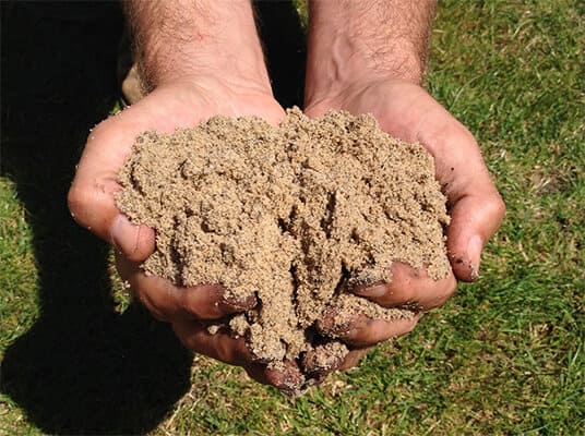 What is Lawn Sand? How & When to Apply it for Best Results 3 lawn sand dressing