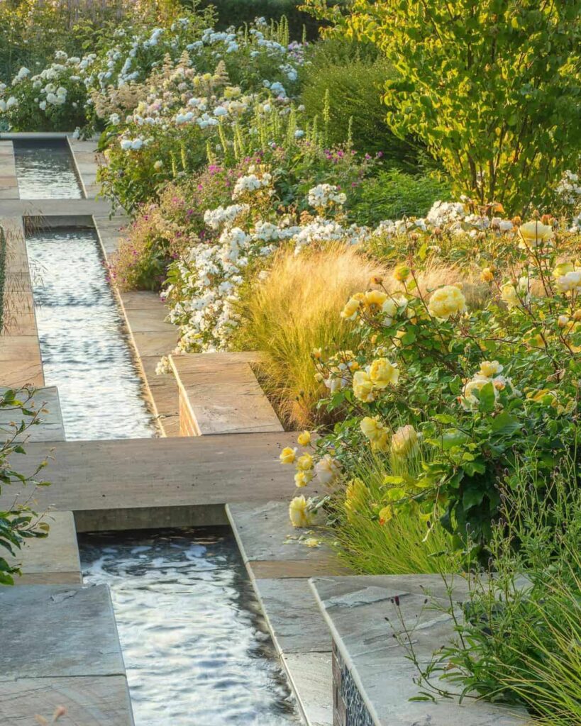 Sloped Garden Ideas: 15 Ways to Work With a Gradient in Your Garden 11 sloped garden water feature