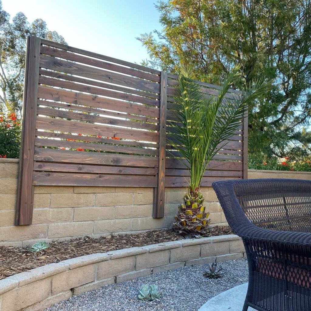26 Privacy Fence Ideas to Keep Unwanted Eyes Away From Your Space 8 slatted panels
