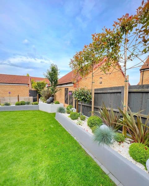 26 Privacy Fence Ideas to Keep Unwanted Eyes Away From Your Space 12 tall bamboo plants on fence